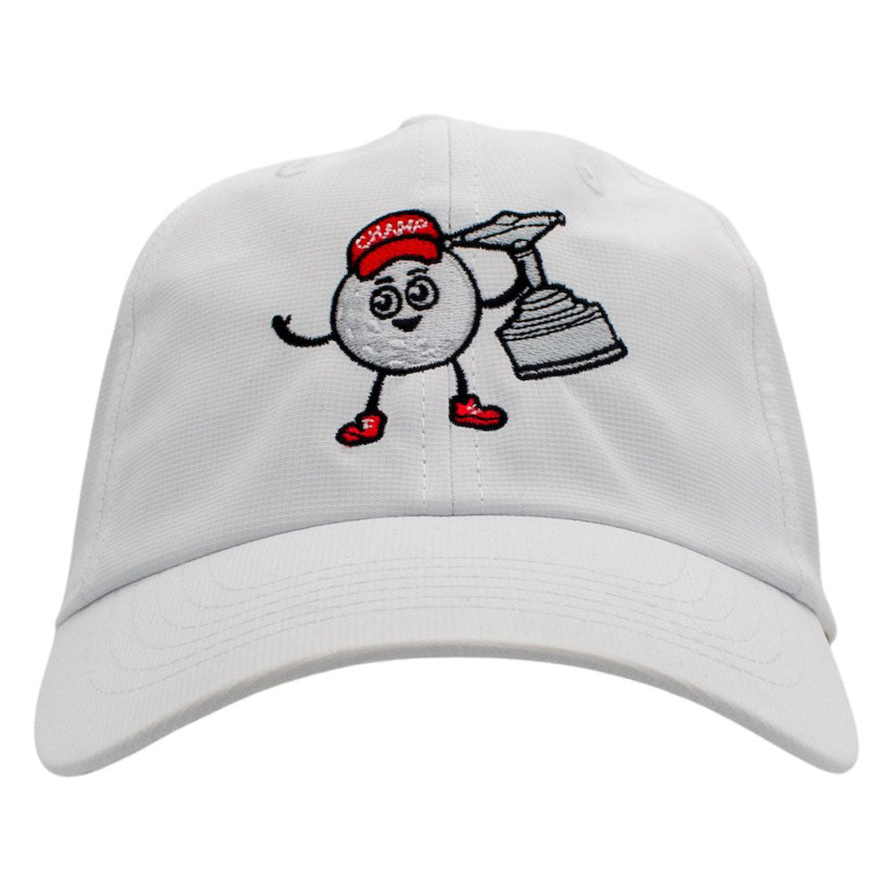 Front of a white performance hat with an embroidered graphic of a personified golf ball holding a trophy and wearing a red champ hat.