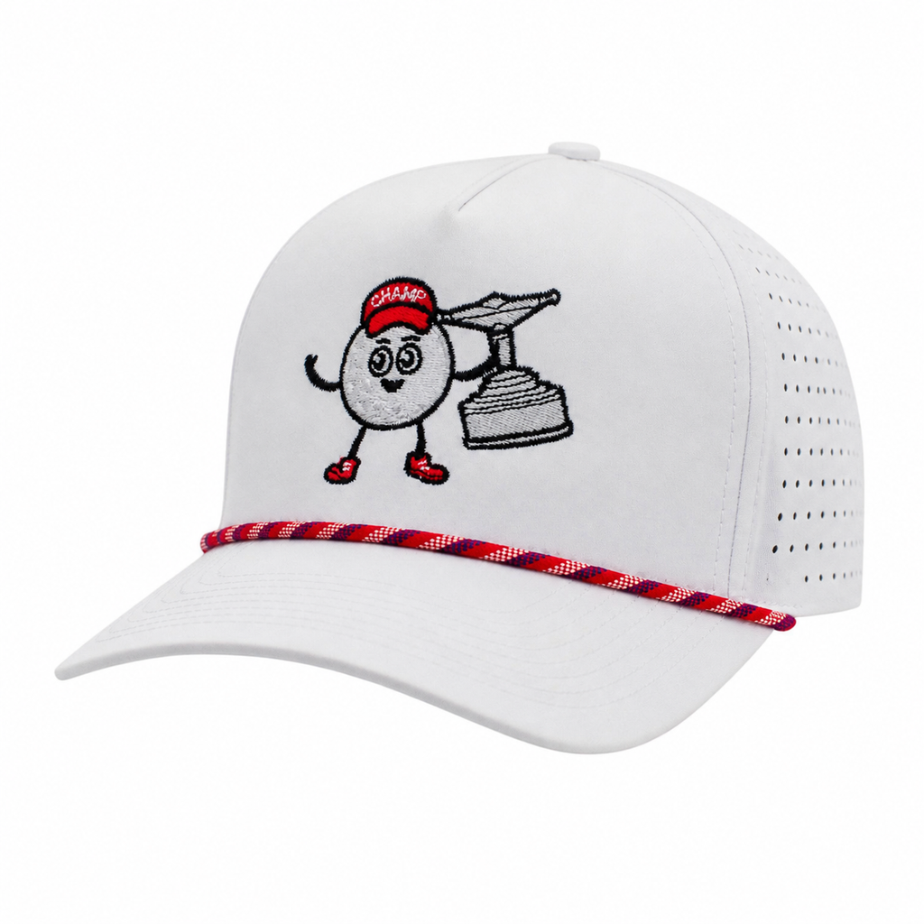 A white hat with a red, white, and blue rope across the bill. Embroidered on the front is a cartoon golf ball with a trophy and a red champ hat.