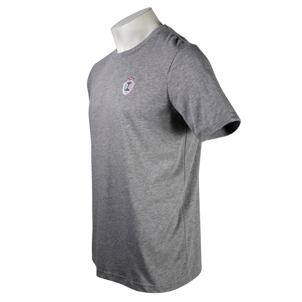 Side of a gray t-shirt with a small logo on the left side of the chest.
