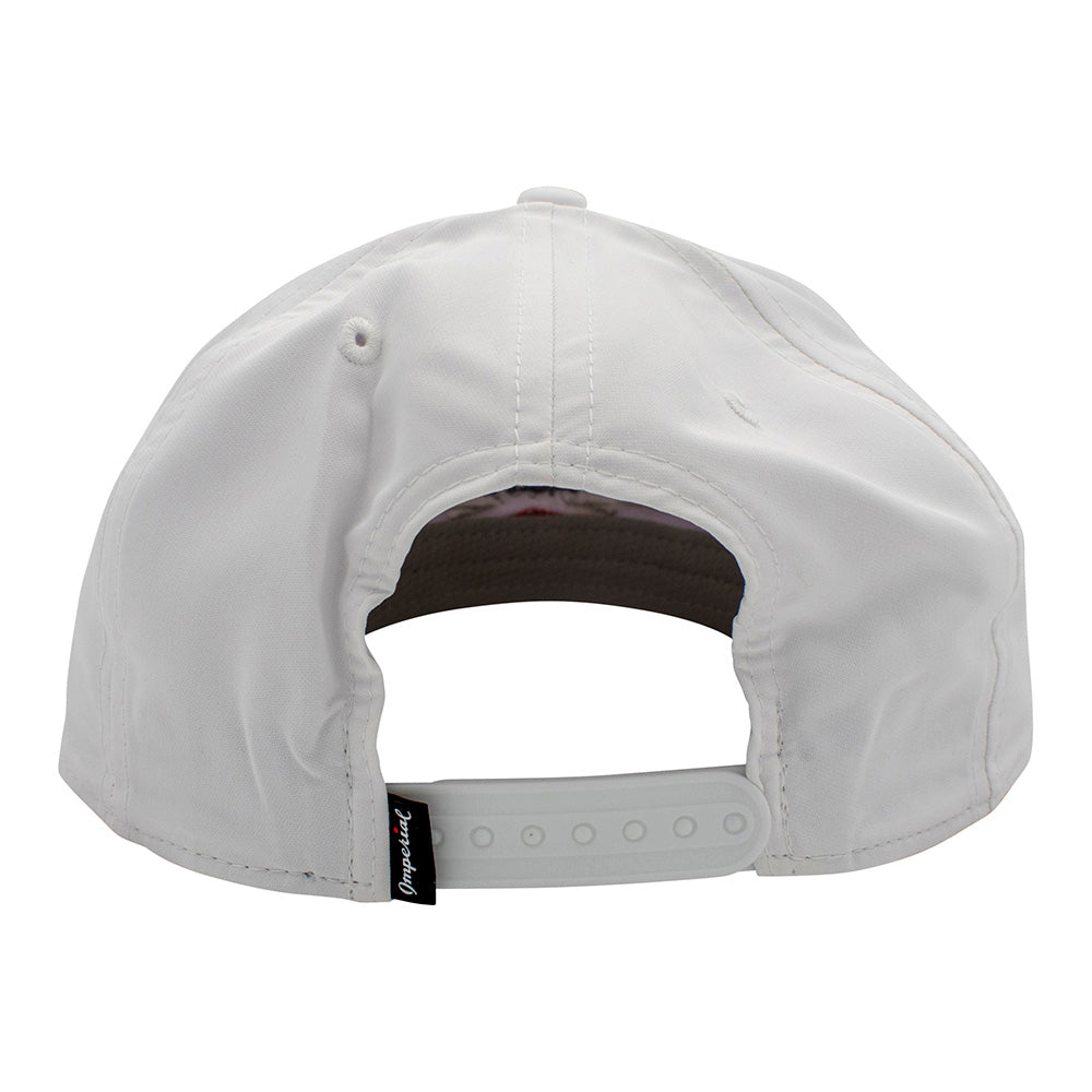 White cap with a brand tag on the back and a hook and loop closure.